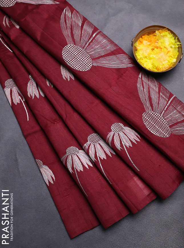 Semi raw silk saree deep maroon with floral embroidery work buttas in borderless style