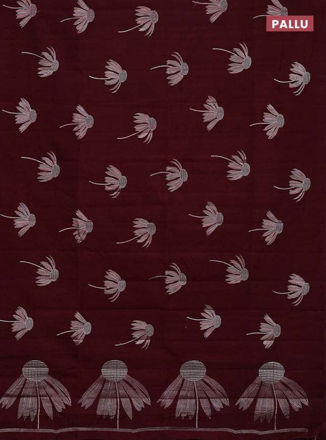 Semi raw silk saree deep maroon with floral embroidery work buttas in borderless style