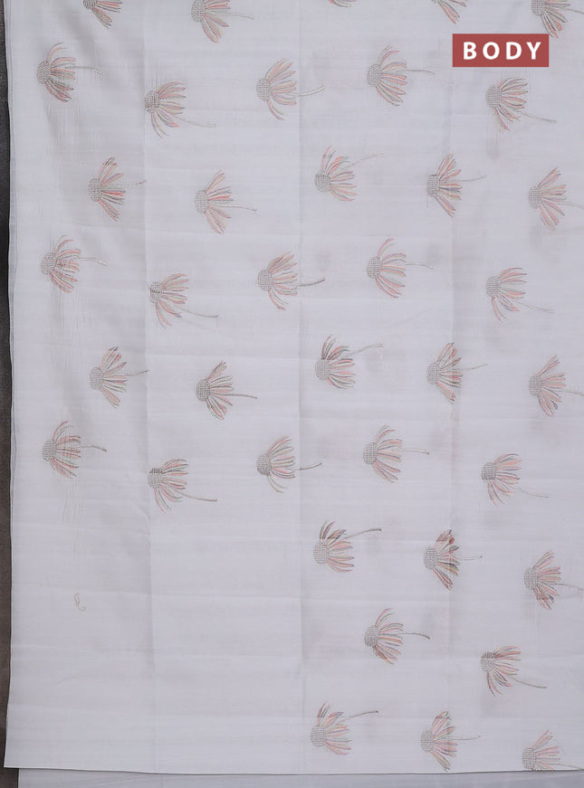 Semi raw silk saree off white with floral embroidery work buttas in borderless style