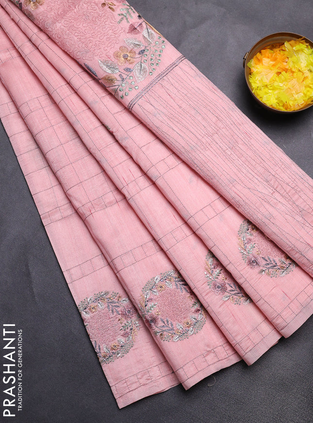 Semi raw silk saree mild peach with allover embroidery work buttas in borderless style