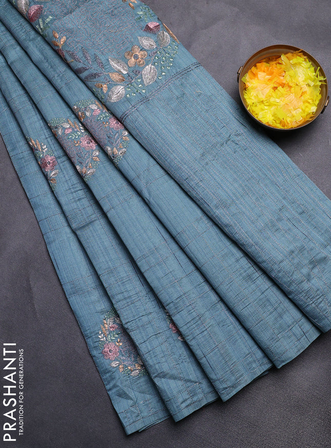 Semi raw silk saree pastel blue shade with allover embroidery work buttas in borderless style