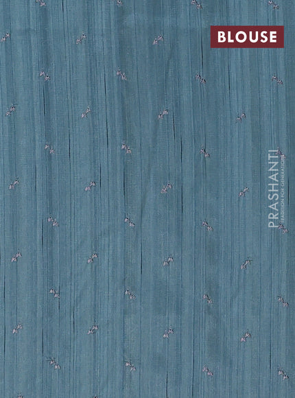 Semi raw silk saree pastel blue shade with allover embroidery work buttas in borderless style