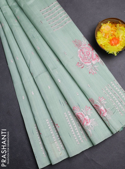 Semi raw silk saree pastel green with embroidery buttas and embroidery butta border