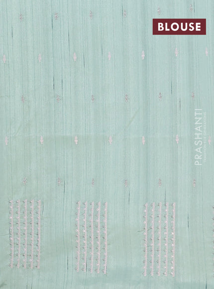 Semi raw silk saree pastel green with embroidery buttas and embroidery butta border