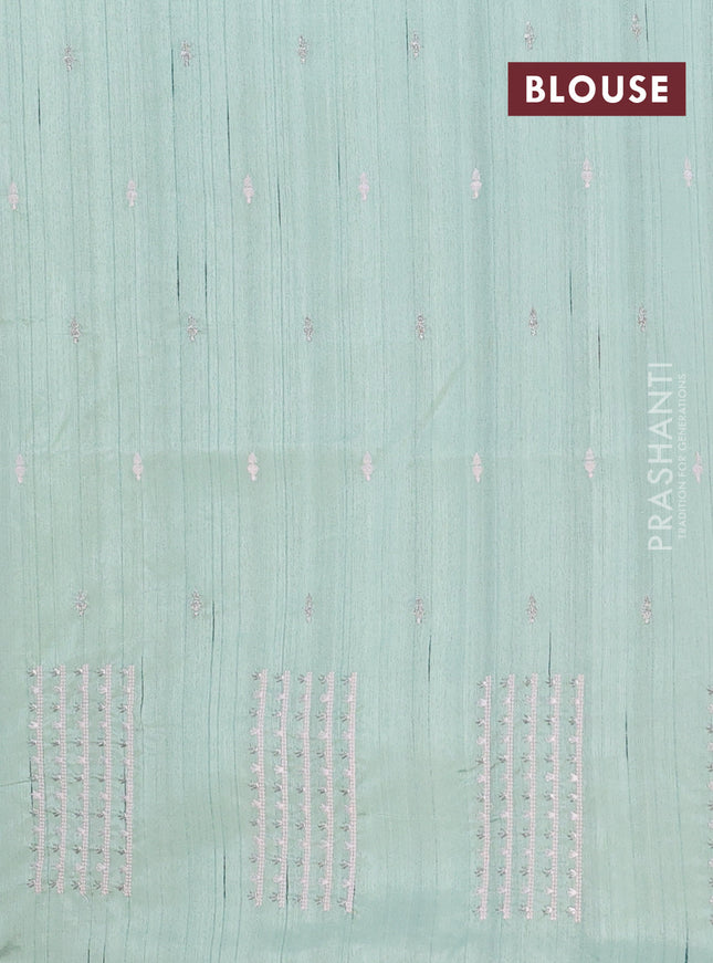 Semi raw silk saree pastel green with embroidery buttas and embroidery butta border