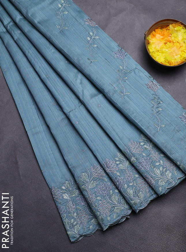 Semi raw silk saree pastel blue shade with embroidery buttas and embroidery border