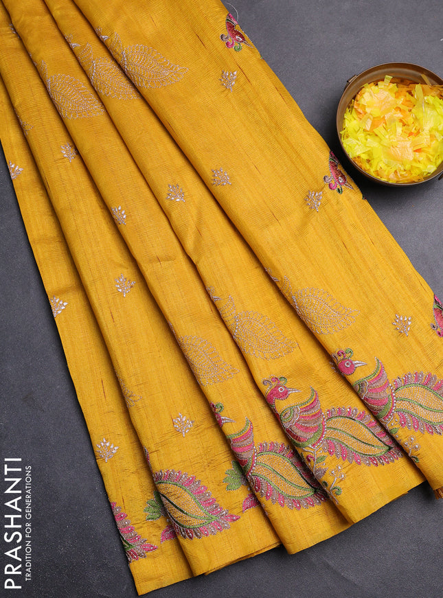 Semi raw silk saree mango yellow with embroidery work buttas and peacock embroidery border