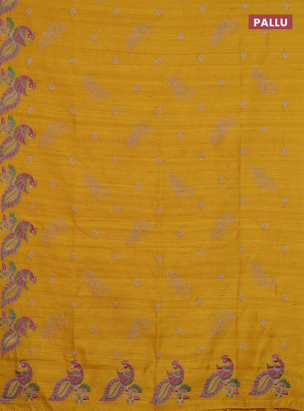 Semi raw silk saree mango yellow with embroidery work buttas and peacock embroidery border