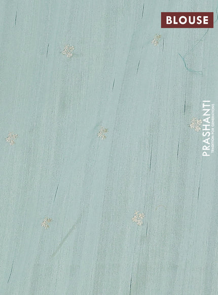 Semi raw silk saree pastel green with embroidery work buttas and floral embroidery border