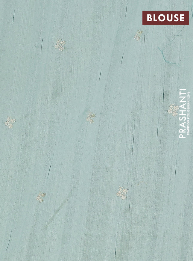 Semi raw silk saree pastel green with embroidery work buttas and floral embroidery border