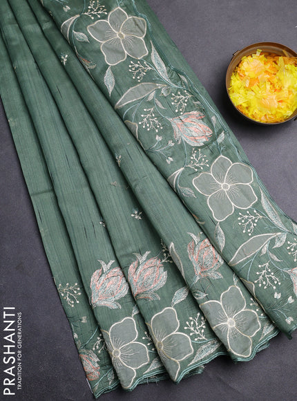 Semi raw silk saree green shade with embroidery work buttas and floral embroidery border