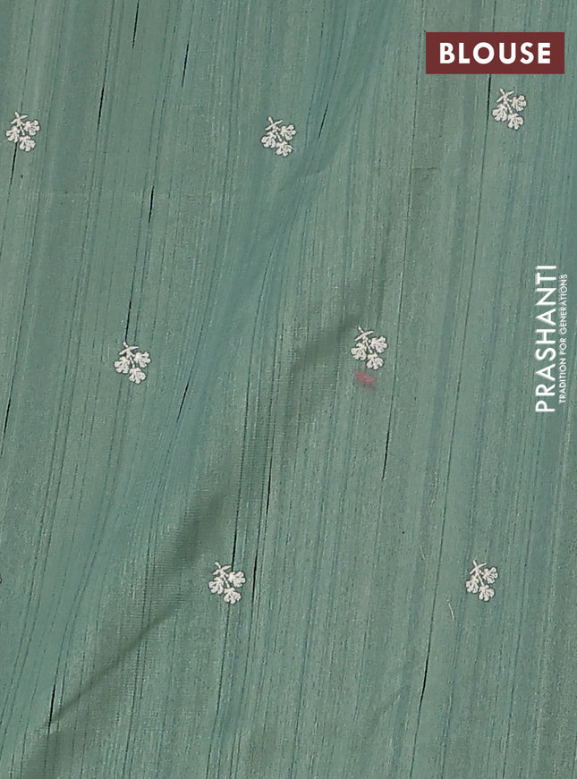 Semi raw silk saree green shade with embroidery work buttas and floral embroidery border
