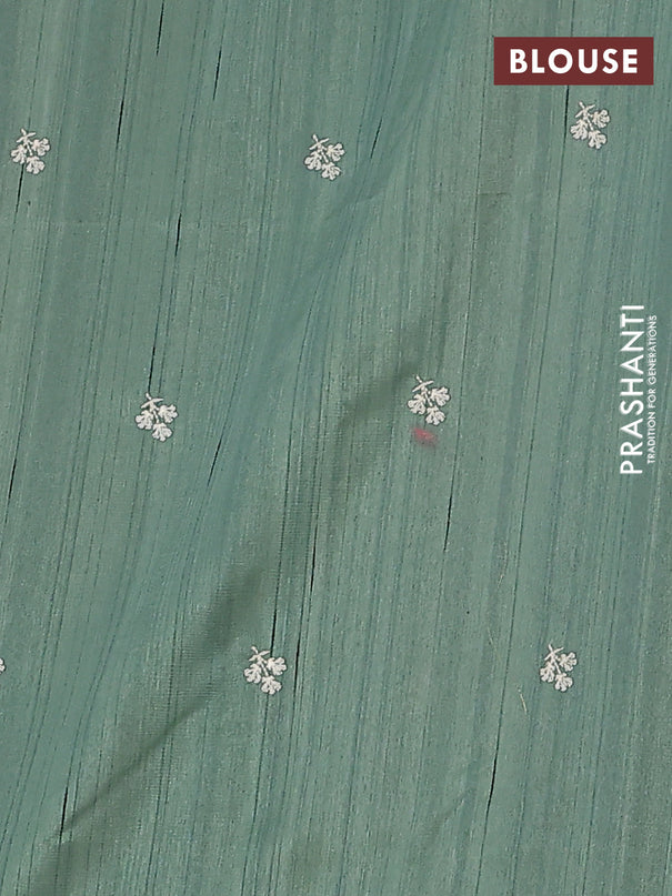 Semi raw silk saree green shade with embroidery work buttas and floral embroidery border