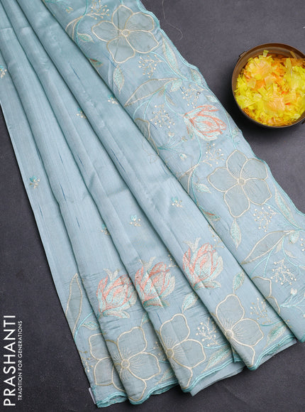 Semi raw silk saree pastel blue with embroidery work buttas and floral embroidery border