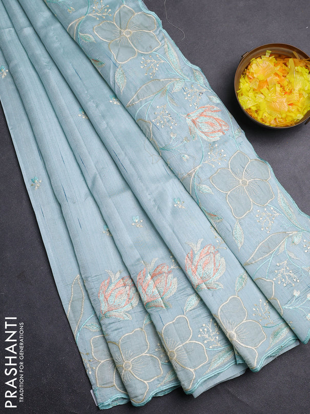Semi raw silk saree pastel blue with embroidery work buttas and floral embroidery border