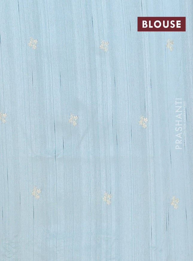 Semi raw silk saree pastel blue with embroidery work buttas and floral embroidery border
