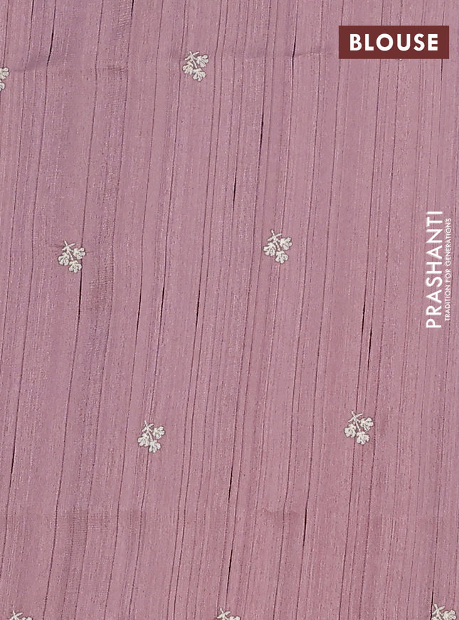 Semi raw silk saree pastel purple shade with embroidery work buttas and floral embroidery border