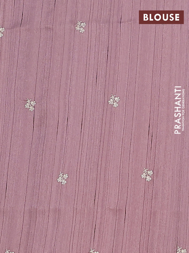 Semi raw silk saree pastel purple shade with embroidery work buttas and floral embroidery border