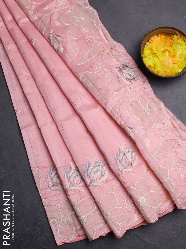 Semi raw silk saree mild peach orange with embroidery work buttas and floral embroidery border