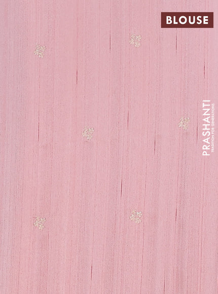 Semi raw silk saree mild peach orange with embroidery work buttas and floral embroidery border