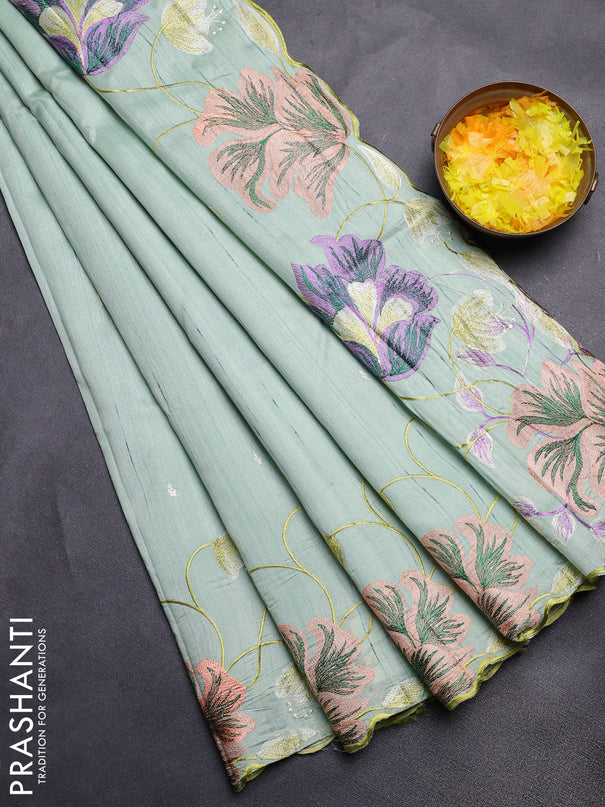 Semi raw silk saree pastel green with embroidery work buttas and floral embroidery border