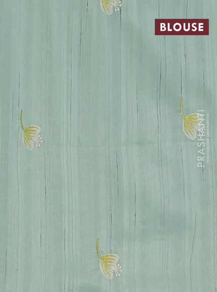 Semi raw silk saree pastel green with embroidery work buttas and floral embroidery border