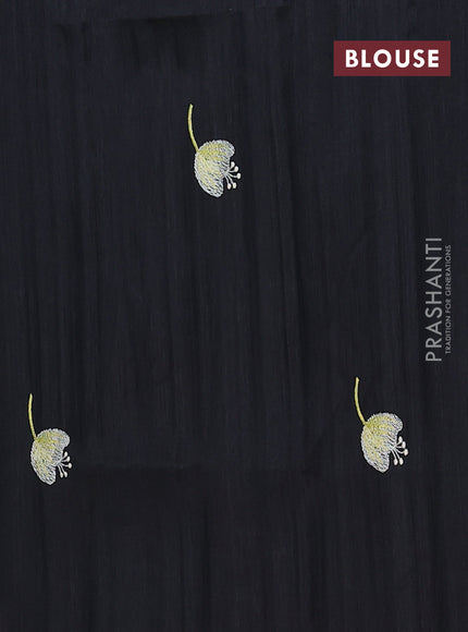 Semi raw silk saree black with embroidery work buttas and floral embroidery border