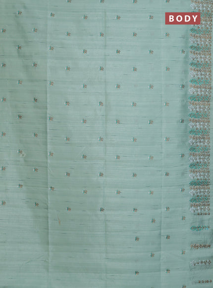 Semi raw silk saree pastel green with floral embroidery work buttas and embroidery border