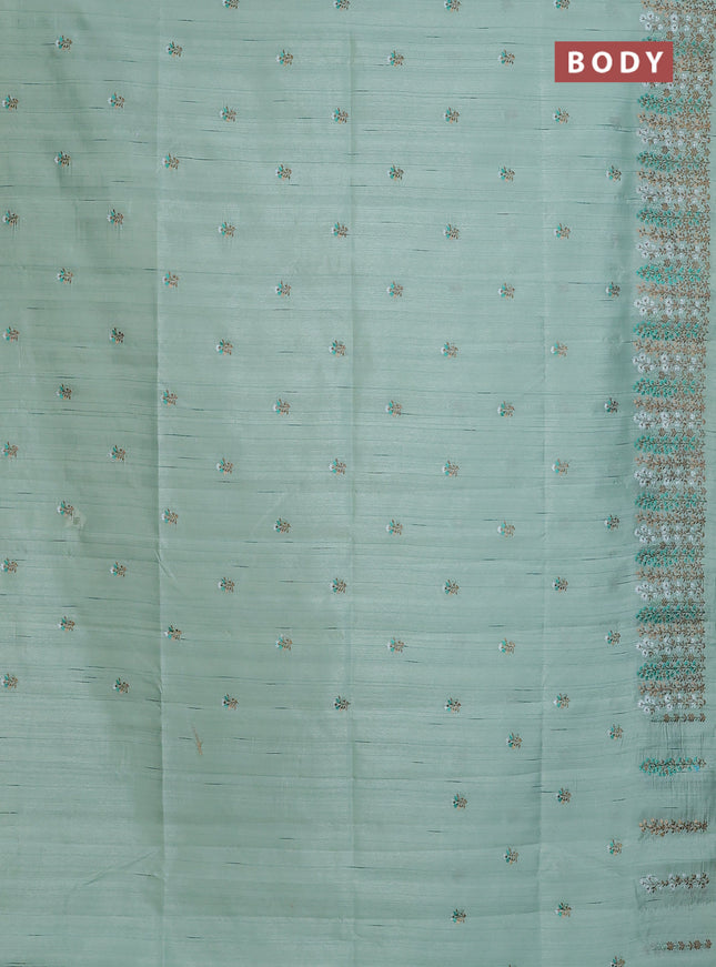 Semi raw silk saree pastel green with floral embroidery work buttas and embroidery border