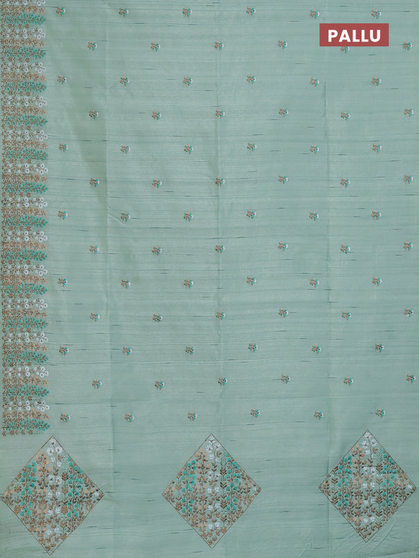 Semi raw silk saree pastel green with floral embroidery work buttas and embroidery border
