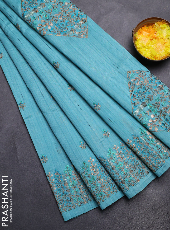 Semi raw silk saree teal blue with floral embroidery work buttas and embroidery border