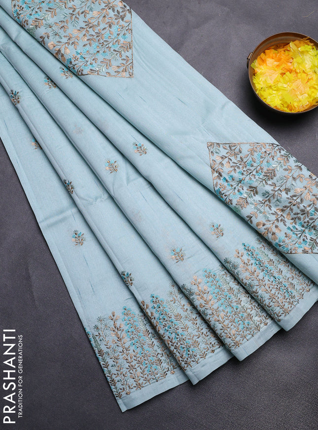 Semi raw silk saree pastel blue with floral embroidery work buttas and embroidery border