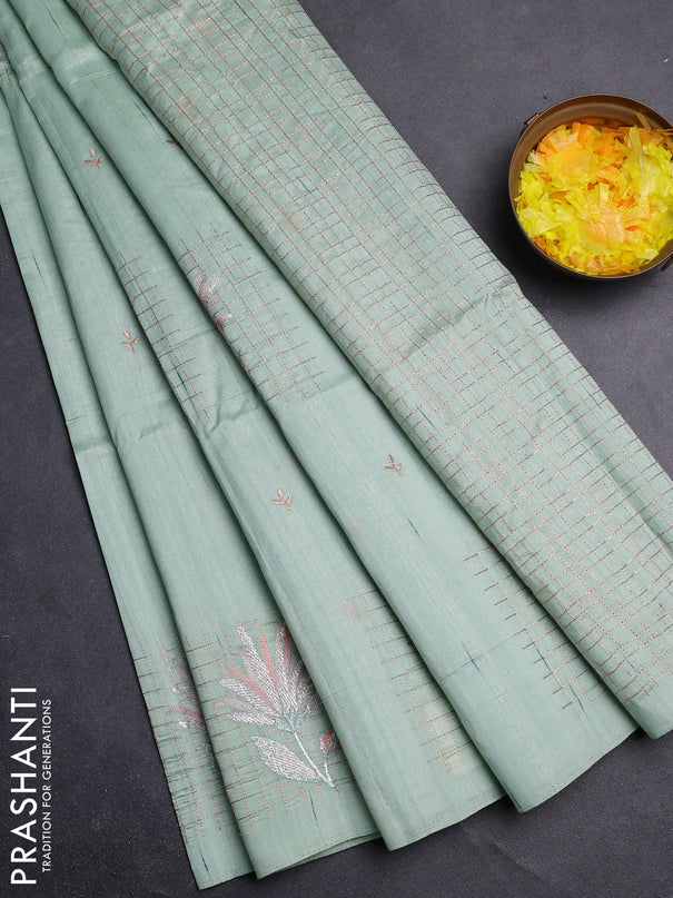 Semi raw silk saree pastel green with embroidery buttas and embroidery butta border