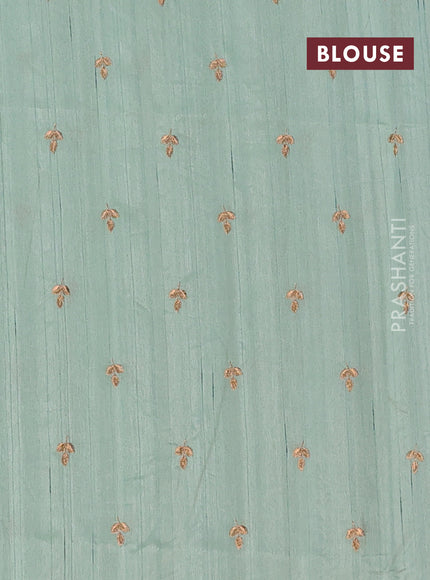 Semi raw silk saree pastel green with embroidery buttas and embroidery butta border