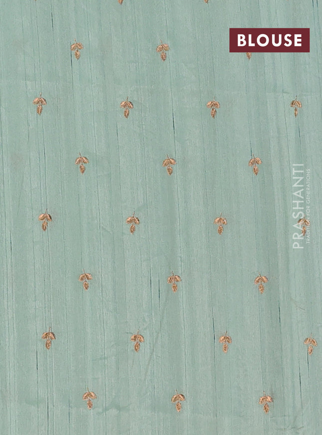 Semi raw silk saree pastel green with embroidery buttas and embroidery butta border