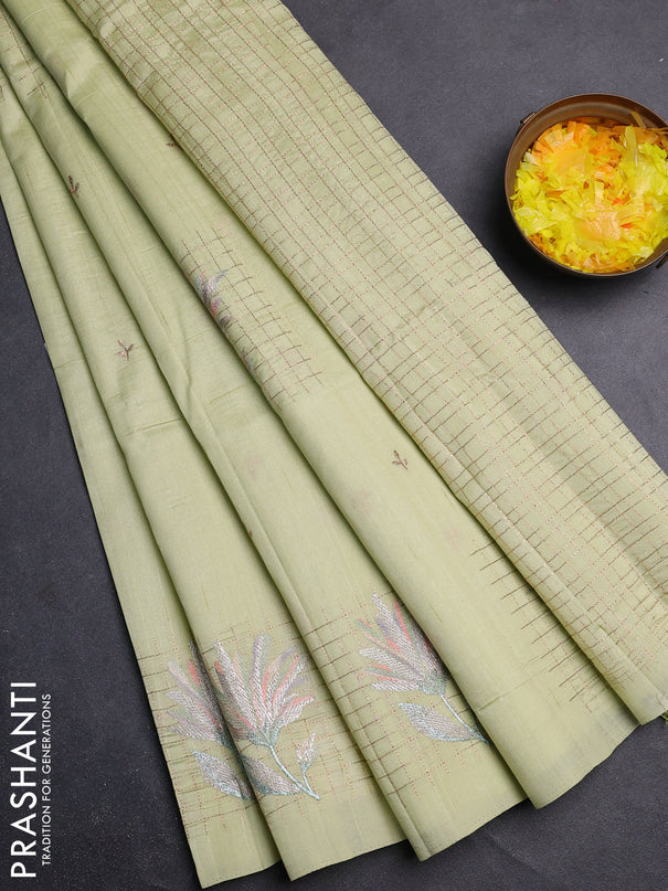 Semi raw silk saree pista green with embroidery buttas and embroidery butta border