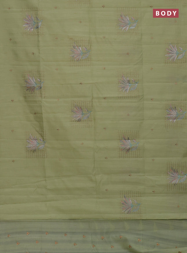 Semi raw silk saree pista green with embroidery buttas and embroidery butta border
