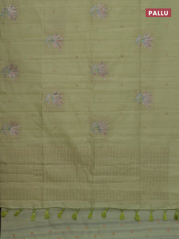 Semi raw silk saree pista green with embroidery buttas and embroidery butta border