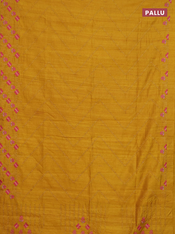 Semi raw silk saree mustard yellow with allover embrodery work and embroidery border