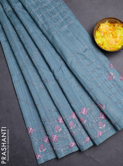 Semi raw silk saree pastel blue shade with allover embrodery work and embroidery border