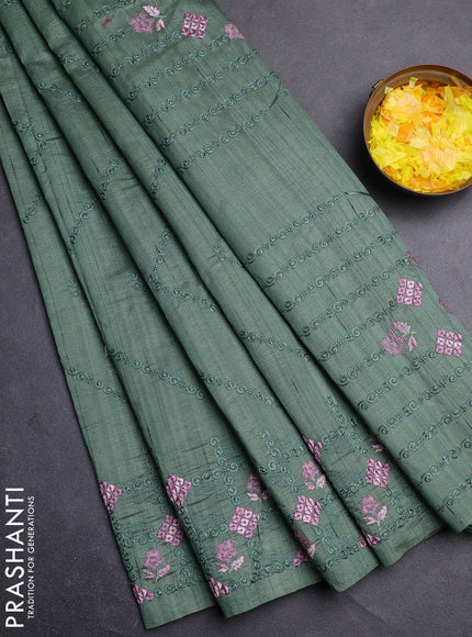 Semi raw silk saree green shade with allover embrodery work and embroidery border