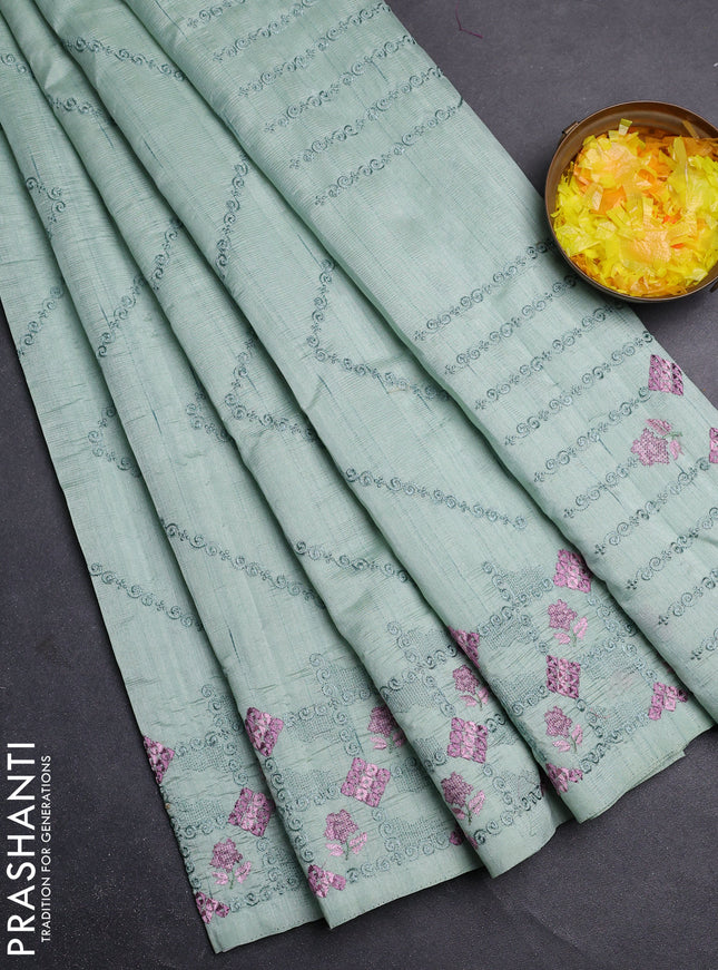 Semi raw silk saree pastel green with allover embrodery work and embroidery border