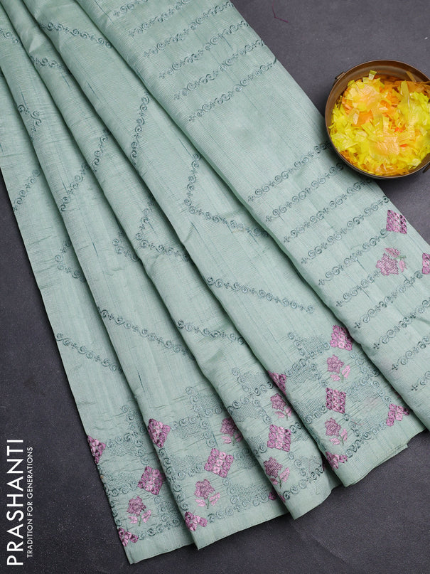 Semi raw silk saree pastel green with allover embrodery work and embroidery border