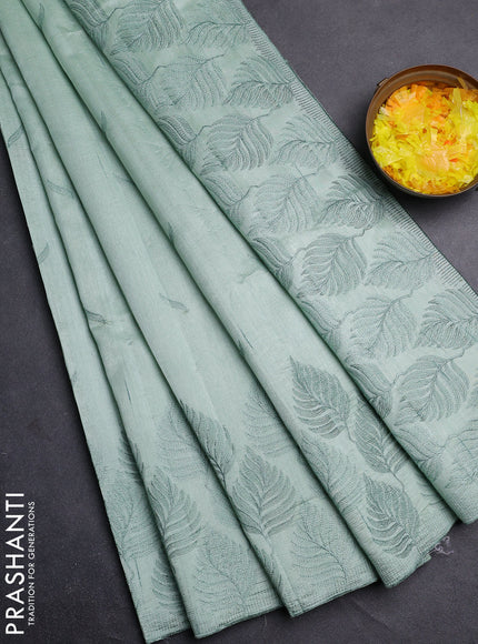 Semi raw silk saree pastel green with embroidery buttas and leaf embroidery border