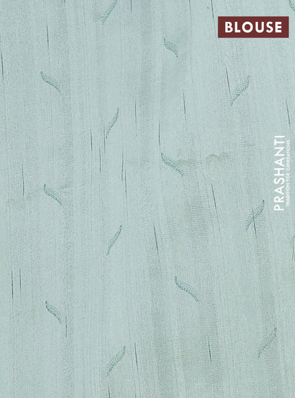 Semi raw silk saree pastel green with embroidery buttas and leaf embroidery border