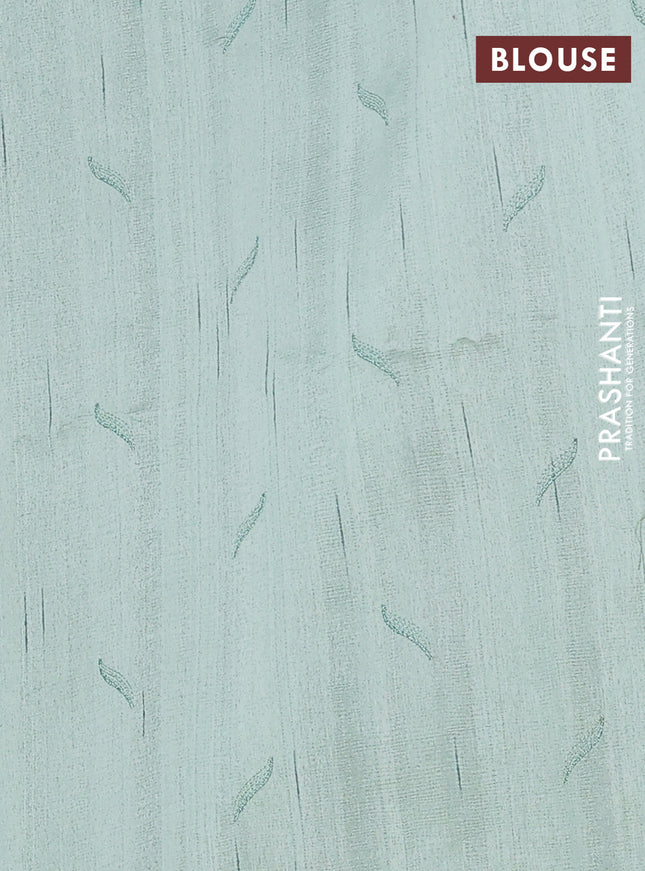 Semi raw silk saree pastel green with embroidery buttas and leaf embroidery border