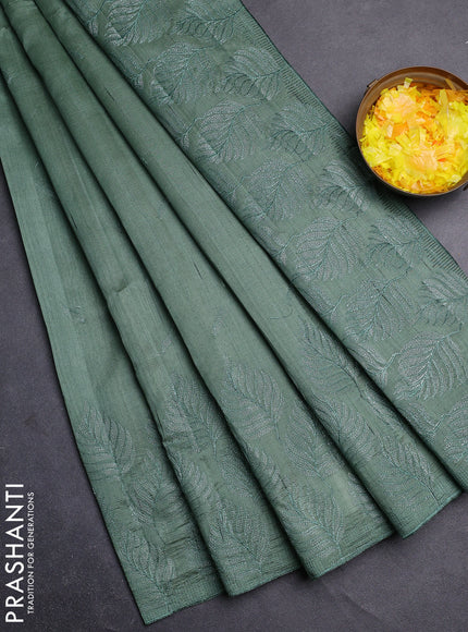 Semi raw silk saree green shade with embroidery buttas and leaf embroidery border