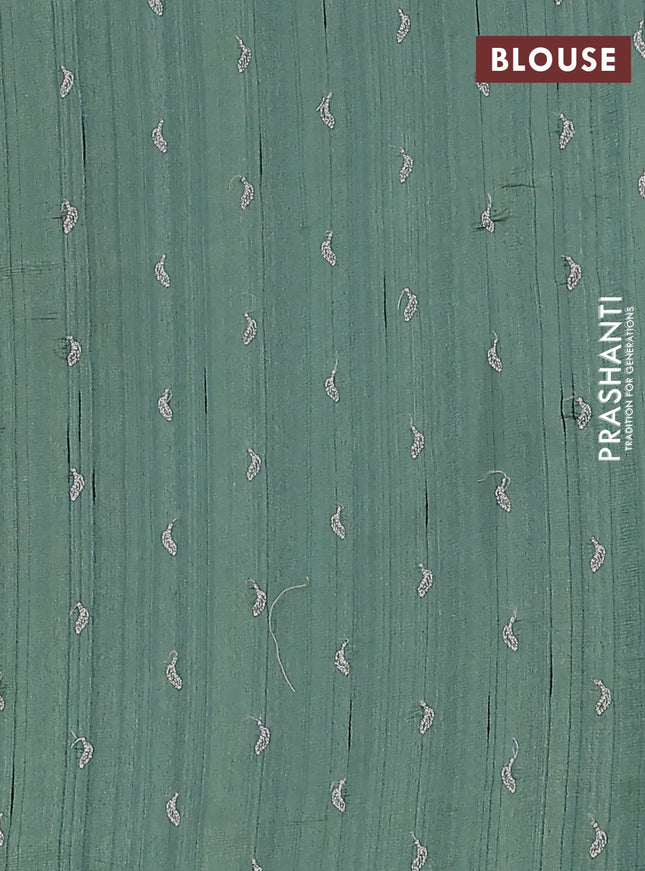 Semi raw silk saree green shade with leaf embroidery buttas in borderless style