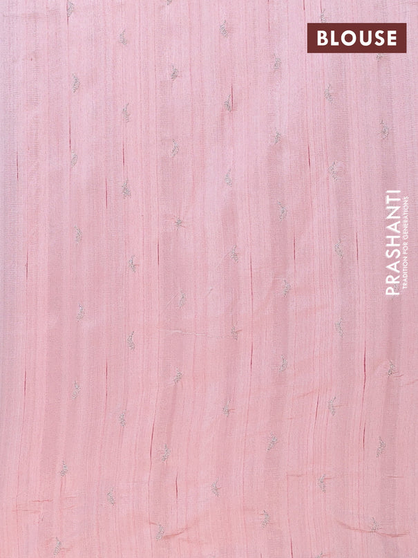 Semi raw silk saree peach shade with leaf embroidery buttas in borderless style