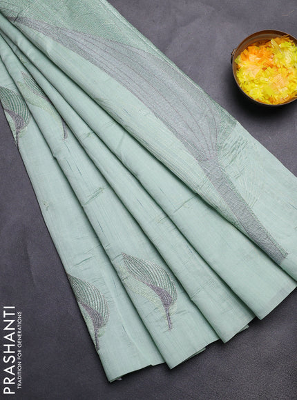 Semi raw silk saree pastel green with leaf embroidery buttas in borderless style